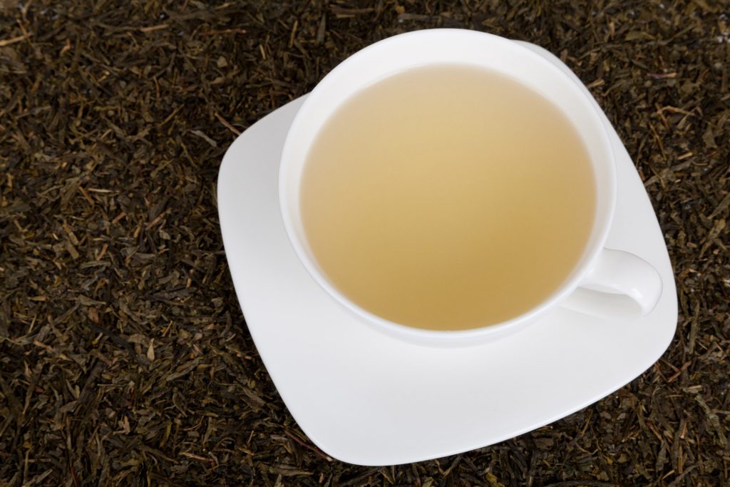 white-cup-of-a-green-tea